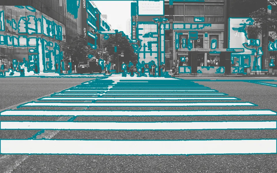Border following (Suzuki and Abe's algorithm) walks the edge of every white region in the thresholded crosswalk and records it as a chain of pixels: 131 closed contours, the longest on the road traced by 4,017 boundary points.